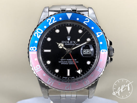 1980s Rolex GMT-Master Fuchsia Bezel Black Dial SS Auto Pilot Watch 16750