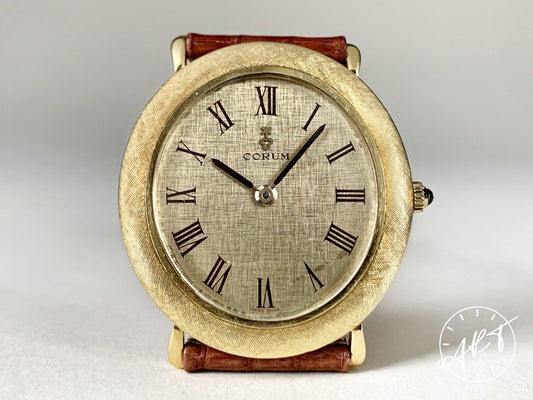 Vintage 1970s Corum 57122 Gold Linen Dial 18K Gold Oval Manual Wind Watch